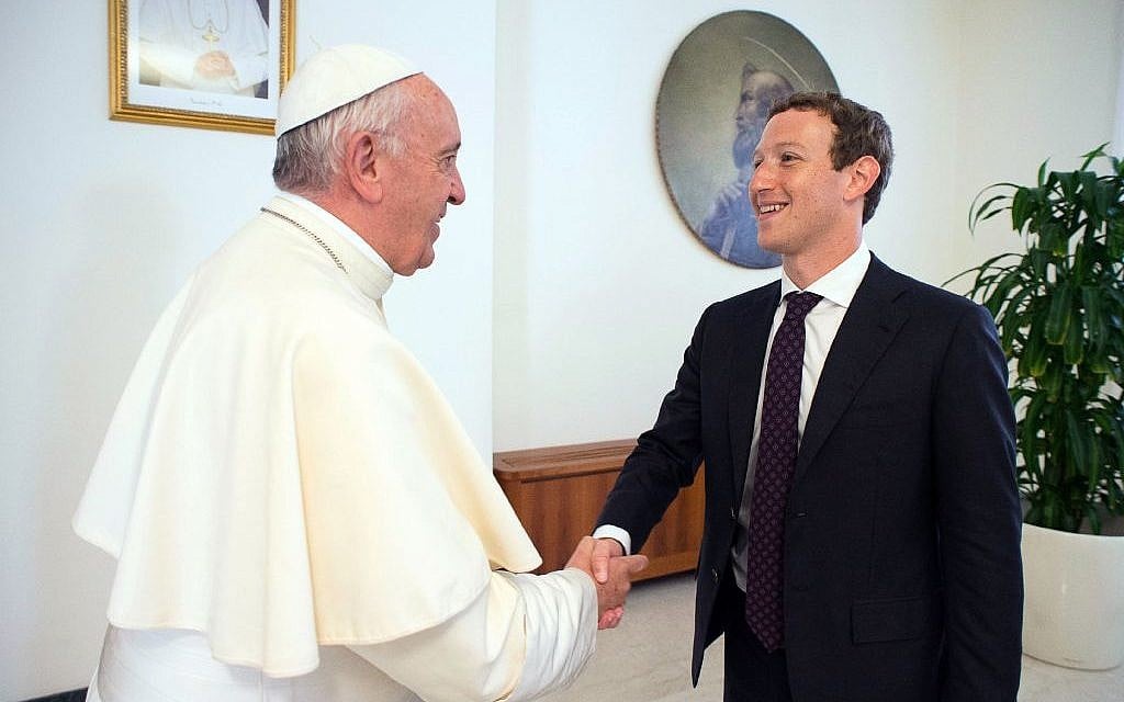 Pope Francis meets Facebook founder and CEO Mark Zuckerberg, at the Santa Marta residence, the guest house in Vatican City where the pope lives, Monday, August 29, 2016. (L'Osservatore Romano/Pool/AP)