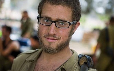 Yisrael Yanover, a former Golani Brigade combat medic, during the 2014 Gaza war. (Courtesy)