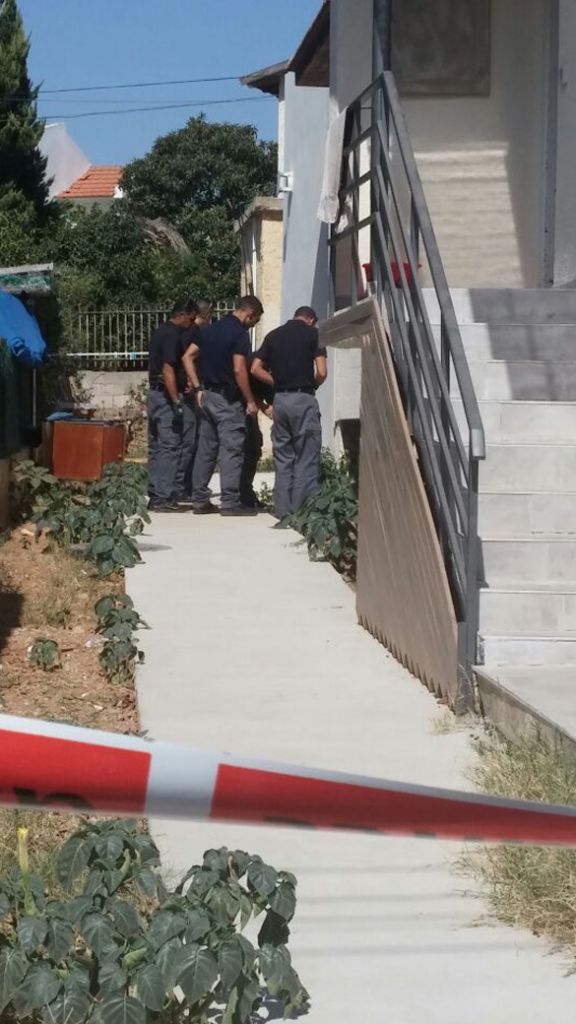 Police officers inspect a rocket fired from the Gaza Strip that landed in the town of Sderot in southern Israel on August 21, 2016. (Israel Police) Police officers inspect a rocket fired from the Gaza Strip that landed in the town of Sderot in southern Israel on August 21, 2016. (Israel Police)