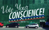 Developer Aby Rosen’s Instagram account features a photo of a billboard at one of his Lower Manhattan building sites that seems to urge voters to turn away from Donald Trump. (Screenshot from Instagram)