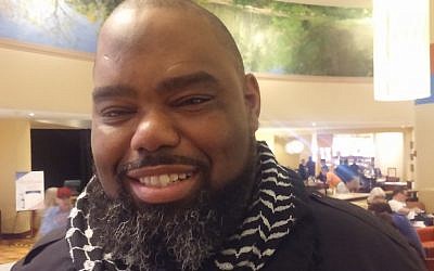 Florida State Sen. Dwight Bullard, wearing a Palestinian kaffiyeh, or headscarf, at the Democratic National Convention, July 2016. (Ben Sales)