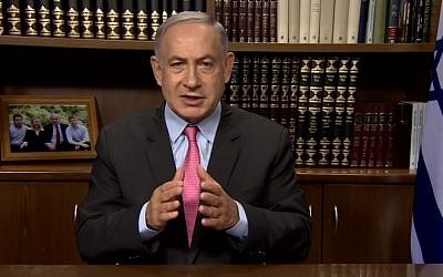 Prime Minister Benjamin Netanyahu speaks in a video published on Facebook on August 11, 2016, in which he slams Hamas for taking aid money to 'build a war machine to murder Jews' (screen capture: Facebook)
