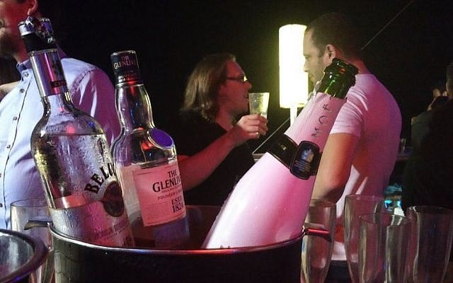 Free drinks at a party held for binary options executives in the Clara club, Tel Aviv, August 12, 2016. (Raoul Wootliff/Times of Israel)