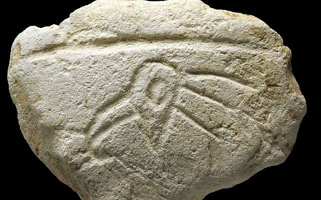 A 16,500-year-old limestone palette engraved with a bird's head found at Ein Qashish in northern Israel. ( CC BY, PLoS ONE; A Unique Assemblage of Engraved Plaquettes from Ein Qashish South, Jezreel Valley, Israel: Figurative and Non-Figurative Symbols of Late Pleistocene Hunters-Gatherers in the Levant)
