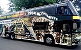 A bus in the Czech Republic advertising the Nazi death camp Auschwitz as fun holiday destination that was originally made as a film prop seen on the website of the Auto Xaver bus company on August 16, 2016. (autoxaver.com)
