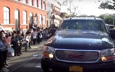 Hasidic children in Kiryas Yoel throw eggs at a mock Netanyahu convoy during an anti-Israel protest in August 2016. (Screenshot/Yeshiva World News)
