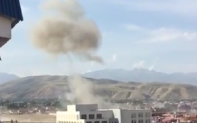 Smoke coming from the Chine embassy in Kyrgyzstan after a car explosion, August 30, 2016. (Screen capture: YouTube)