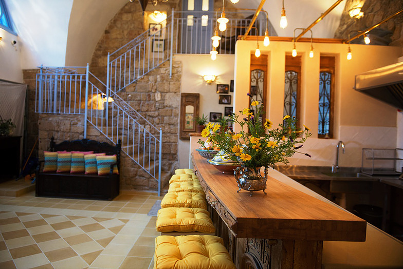 The cosy kitchen and communal living space at the Fallenberg's Arabesque, in Acre's Old City (Courtesy Arabesque)