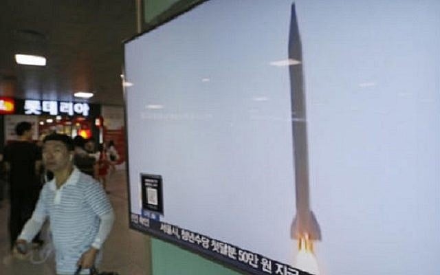 A man passes by a TV news program with file footage of a North Korean rocket launch at the Seoul Railway Station in Seoul, South Korea, Wednesday, Aug. 3, 2016. (AP Photo/Ahn Young-joon) A man passes by a TV news program with file footage of a North Korean rocket launch at the Seoul Railway Station in Seoul, South Korea, Wednesday, Aug. 3, 2016. (AP Photo/Ahn Young-joon)