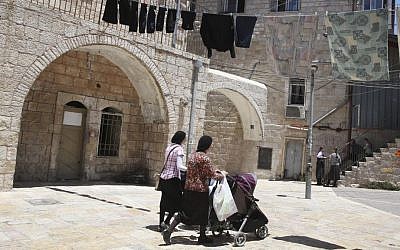 Illustrative: Ultra-Orthodox Jewish women push their baby strollers as they walk in the ultra-Orthodox Mea Shearim neighborhood in Jerusalem, on July 4, 2013. (Nati Shohat/Flash90) Illustrative: Ultra-Orthodox Jewish women push their baby strollers as they walk in the ultra-Orthodox Mea Shearim neighborhood in Jerusalem, on July 4, 2013. (Nati Shohat/Flash90)