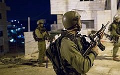 Illustrative: IDF soldiers during an arrest raid in the Dheisheh refugee camp, near the West Bank city of Bethlehem, on December 8, 2015. (Nati Shohat/Flash90)