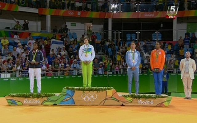 Israeli judoka Yarden Gerbi (2nd right) stands with the other medal winners for the women's under-63kg category during the awards ceremony at the Rio Games on August 9, 2016. Gerbi won bronze,  bringing Israel its first Olympic trophy in eight years (screen capture: Channel 55)