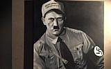 A painting of Adolf Hitler wearing a hat with Donald Trump's campaign slogan, "Make America Great Again," by Portland Jewish artist Matthew Abelman, was been taken down from the Night Light Lounge on August 7, 2016. (screen capture: KATU)