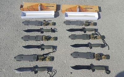A smuggled shipment of commando knives intercepted by Israeli officials at the Kerem Shalom Border Crossing between Israel and Gaza on August 9, 2016 (Defense Ministry Crossing Authority)