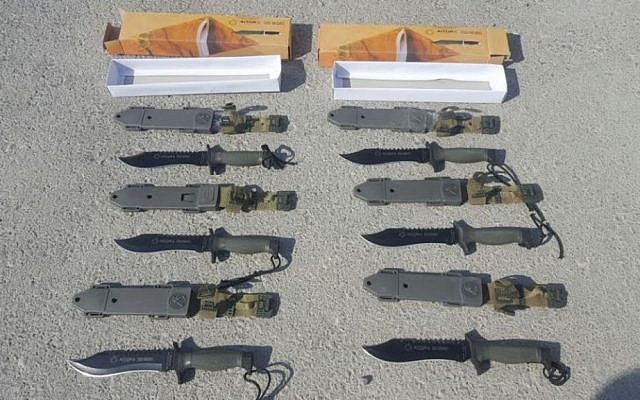 A smuggled shipment of commando knives intercepted by Israeli officials at the Kerem Shalom Border Crossing between Israel and Gaza on August 9, 2016 (Defense Ministry Crossing Authority)