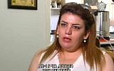 The Jewish Kurdish woman who fled Iraq for Israel after claiming her Muslim husband threatened to sell her to the Islamic State speaks to Channel 2 in August 2016. (screen capture: Channel 2)