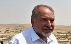 Defense Minister Avigdor Liberman tours Bedouin villages in the Negev, southern Israel, on August 29, 2016 (Ariel Hermoni/Defense Ministry)
