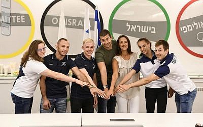 From left to right: Raz Hershko, Andrey Tsaryuk, David Albrdian, Oren Shabat Laurent, Sivan Laurent Shabat, Linoy Ashram and Yuval Freilich (Photo Courtesy Olympic Committee of Israel)