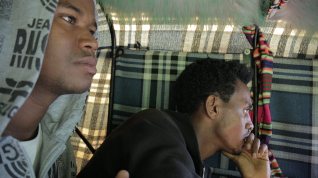 Gezahegn Dereve and Demoz Deboch in a motorcycle taxi in Gondar, Ethiopia, in July, 2016, before heading to the United States for a five week speaking tour. (courtesy Ryan Porush)