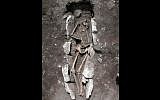This undated photo released Aug. 10, 2016, provided by the Greek Culture Ministry, shows the 11th century BCE skeleton of a teenager excavated recently at Mount Lykaion in the southern Peloponnese region of Greece, the mountaintop sanctuary of Zeus, king of the ancient Greek gods. (Greek Culture Ministry via AP)