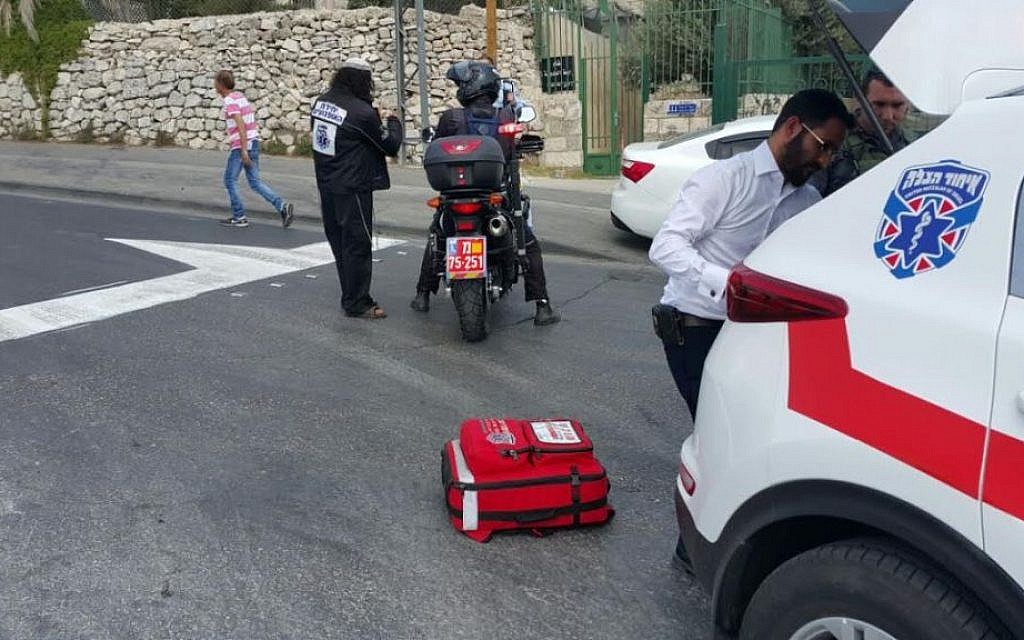 Rescue personnel attend the scene of a stabbing attack in the A-Tur neighborhood of East Jerusalem on August 11, 2016 (photo credit: United Hatzalah) Rescue personnel attend the scene of a stabbing attack in the A-Tur neighborhood of East Jerusalem on August 11, 2016 (photo credit: United Hatzalah)