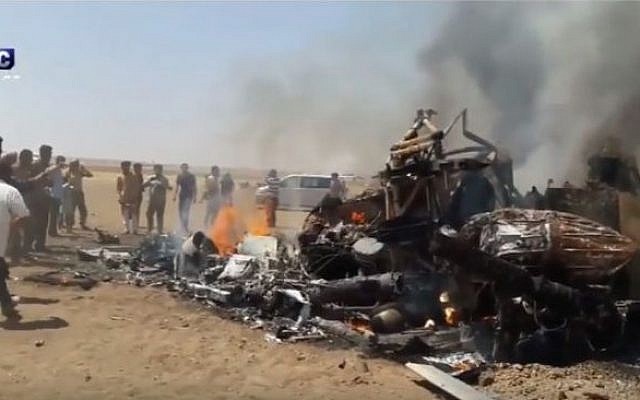 An image purportedly showing the wreckage of a Russian military helicopter shot down over Idlib, Syria on August 1, 2016. (screen capture: YouTube) An image purportedly showing the wreckage of a Russian military helicopter shot down over Idlib, Syria on August 1, 2016. (screen capture: YouTube)