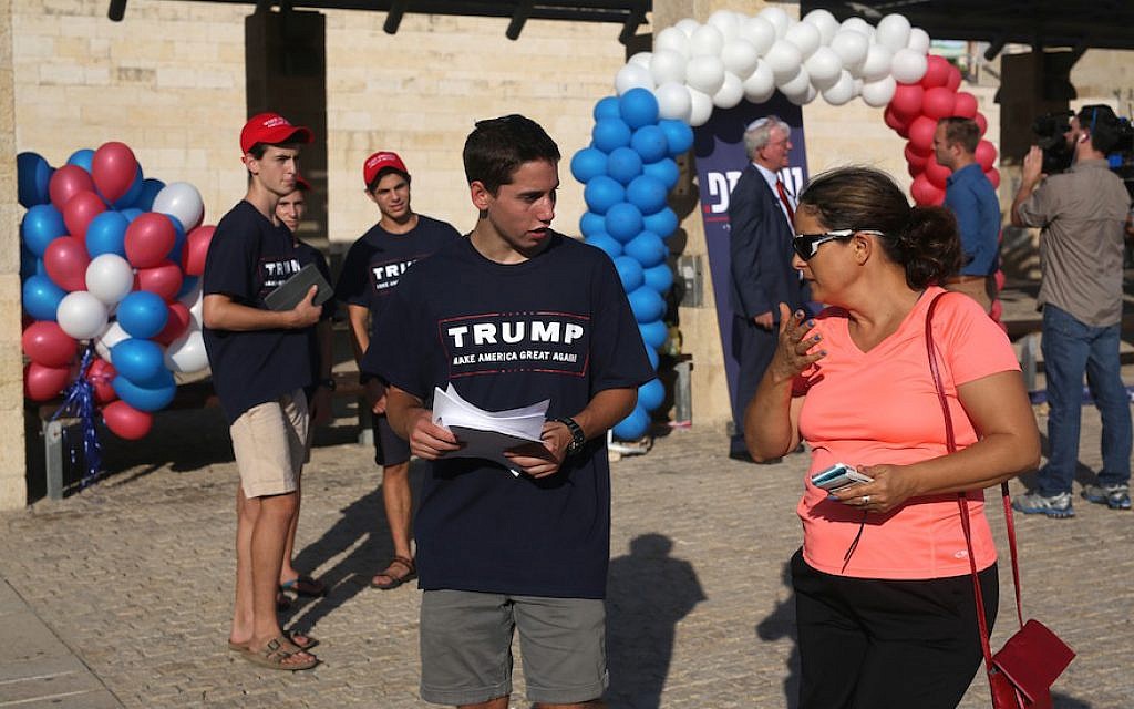 A teenage volunteer for Donald Trump campaigning outside the Republican candidate’s headquarters in Modiin, Aug. 15, 2016. (Menahem Kahana/AFP/Getty Images)