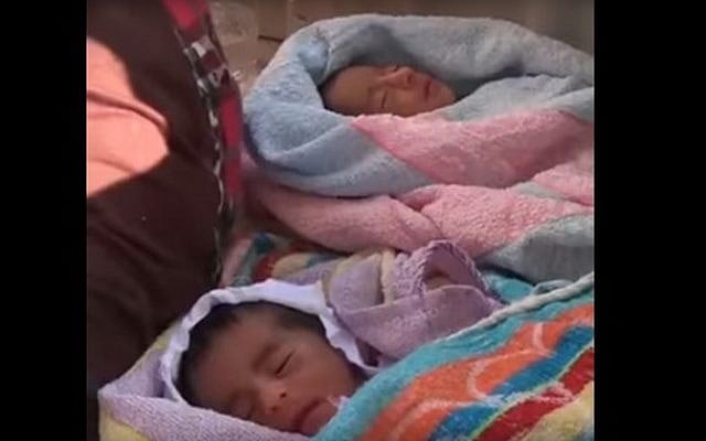 Five-day-old twins were among 6,500 people rescued from the Mediterranean Sea off the Libyan coast on August 30, 2016 (screen capture: YouTube) Five-day-old twins were among 6,500 people rescued from the Mediterranean Sea off the Libyan coast on August 30, 2016 (screen capture: YouTube)