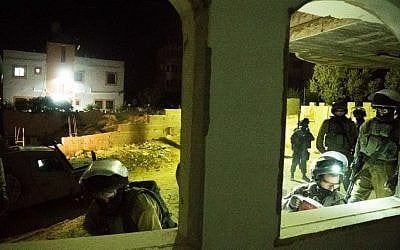 Israeli troops take part in the demolition of the family home of a Palestinian terrorist who killed a 13-year-old girl while she slept in her bed in Kiryat Arba in June, in Bani Na'im, August 15, 2016. (IDF Spokesperson's Unit) Israeli troops take part in the demolition of the family home of a Palestinian terrorist who killed a 13-year-old girl while she slept in her bed in Kiryat Arba in June, in Bani Na'im, August 15, 2016. (IDF Spokesperson's Unit)