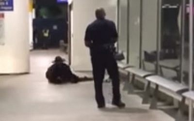Police approach a man dressed as Zorro at Los Angeles Airport, August 29, 2016. (Youtube screenshot)