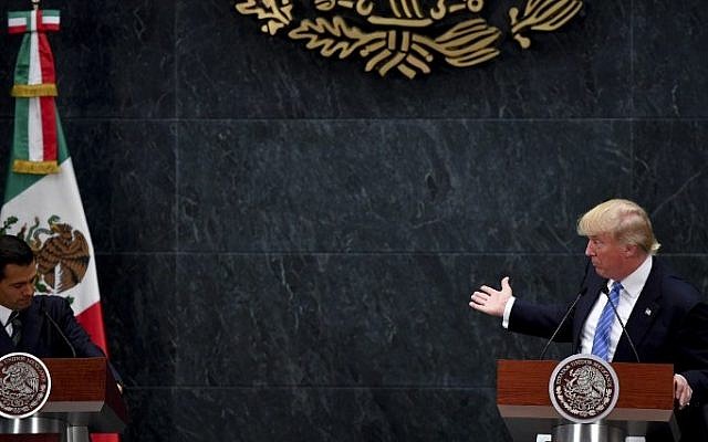 US presidential candidate Donald Trump delivers a joint press conference with Mexican President Enrique Pena Nieto in Mexico City on August 31, 2016.  (AFP)