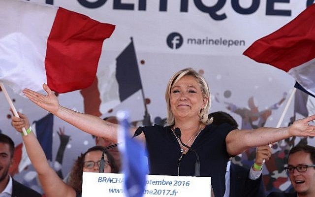 French far-right party Front National (FN) President and member of the European Parliament, Marine Le Pen gestures as she delivers a speech on September 3, 2016 during a FN political rally in Brachay, northeastern France. (AFP PHOTO / FRANCOIS NASCIMBENI) French far-right party Front National (FN) President and member of the European Parliament, Marine Le Pen gestures as she delivers a speech on September 3, 2016 during a FN political rally in Brachay, northeastern France. (AFP PHOTO / FRANCOIS NASCIMBENI)