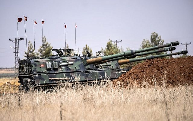 Turkish tanks are seen during clashes between Turkish soldiers and Islamic State group fighters, 20 km west of the Turkish-Syrian border town of Karkamis, in the southern region of Gaziantep, on September 3, 2016. (AFP/Bulent Kilic) Turkish tanks are seen during clashes between Turkish soldiers and Islamic State group fighters, 20 km west of the Turkish-Syrian border town of Karkamis, in the southern region of Gaziantep, on September 3, 2016. (AFP/Bulent Kilic)