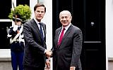 Dutch Prime Minister Mark Rutte shakes hands with Prime Minister Benjamin Netanyahu in The Hague. (AFP PHOTO / ANP / Robin UTRECHT)