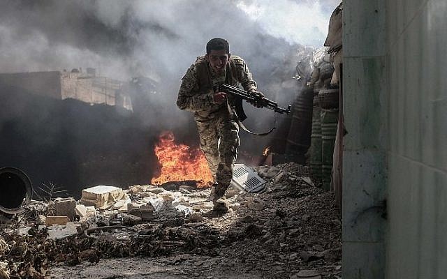 A fighter from the Jaish al-Islam (Islam Army) runs to avoid sniper fire, in the village of Tal al-Siwan area of the rebel-held stronghold of Douma, on the outskirts of Damascus, Syria on September 5, 2016. (AFP Photo/Sameer Al-Doumy) A fighter from the Jaish al-Islam (Islam Army) runs to avoid sniper fire, in the village of Tal al-Siwan area of the rebel-held stronghold of Douma, on the outskirts of Damascus, Syria on September 5, 2016. (AFP Photo/Sameer Al-Doumy)