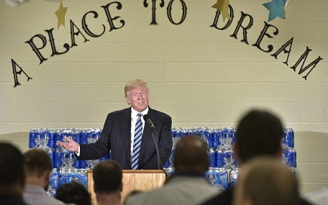 Republican presidential nominee Donald Trump speaks at the Bethel United Methodist Church on September 14, 2016 in Flint, Michigan. (AFP PHOTO / MANDEL NGAN) Republican presidential nominee Donald Trump speaks at the Bethel United Methodist Church on September 14, 2016 in Flint, Michigan. (AFP PHOTO / MANDEL NGAN)