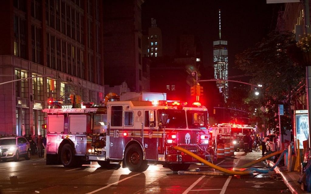 A fire truck is seen near a blocked off road near the site of an alleged bomb explosion on West 23rd Street on September 17, 2016, in New York. (AFP/ Bryan R. Smith)