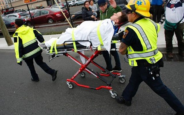 An injured man is evacuated at New Jersey Transit's rail station in Hoboken, New Jersey September 29, 2016. (AFP PHOTO / KENA BETANCUR) An injured man is evacuated at New Jersey Transit's rail station in Hoboken, New Jersey September 29, 2016. (AFP PHOTO / KENA BETANCUR)