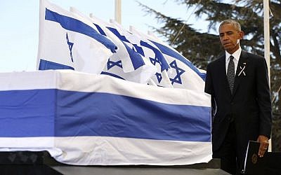 US President Barack Obama touches the coffin of former Israeli president and prime minister Shimon Peres after speaking during his funeral at Jerusalem's Mount Herzl national cemetery on September 30, 2016. (AFP/Pool/Abir Sultan) US President Barack Obama touches the coffin of former Israeli president and prime minister Shimon Peres after speaking during his funeral at Jerusalem's Mount Herzl national cemetery on September 30, 2016. (AFP/Pool/Abir Sultan)
