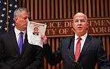 New York City police commissioner James O'Neill holds up a picture of Ahmad Khan Rahami, the man believed to be responsible for the explosion in Manhattan on Saturday night and an earlier bombing in New Jersey, at a news conference at New York City on September 19, 2016 in New York City. (Spencer Platt/Getty Images/AFP)