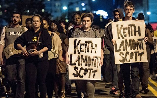 Demonstrators march during protests, September 22, 2016 in Charlotte, North Carolina. (Sean Rayford/Getty Images/AFP)