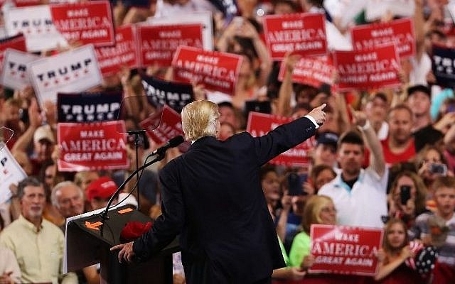 Donald Trump speaks to a large group of supporters at a Florida airport hanger the day after his first debate with Hillary Clinton on September 27, 2016 in Melbourne, Florida. (Spencer Platt/Getty Images/AFP) Donald Trump speaks to a large group of supporters at a Florida airport hanger the day after his first debate with Hillary Clinton on September 27, 2016 in Melbourne, Florida. (Spencer Platt/Getty Images/AFP)