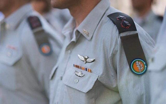 IDF officers wearing the tag of the new Ground Forces after its merger with the Technological and Logistics Directorate in September 2016. (Ground Forces/Facebook) IDF officers wearing the tag of the new Ground Forces after its merger with the Technological and Logistics Directorate in September 2016. (Ground Forces/Facebook)
