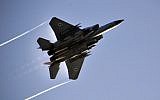 An Israel Air Force F-15 flies overhead during an exercise in the Golan Heights on February 23, 2014. (Gu Ashash/Israel Air Force/Flickr)