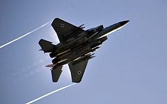 An Israel Air Force F-15 flies overhead during an exercise in the Golan Heights on February 23, 2014. (Gu Ashash/Israel Air Force/Flickr)