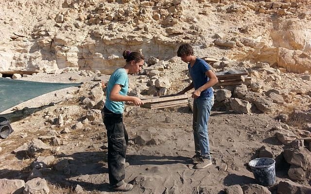 Students of the Har Ha-Negev Field School at work and sifting organic matter at the Avdat national park (Israel Antiquities Authority/Courtesy)