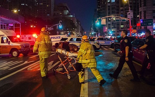 Police and firefighters work near the scene of an explosion in Manhattan's Chelsea neighborhood, in New York, September 17, 2016. (AP/Andres Kudacki) Police and firefighters work near the scene of an explosion in Manhattan's Chelsea neighborhood, in New York, September 17, 2016. (AP/Andres Kudacki)