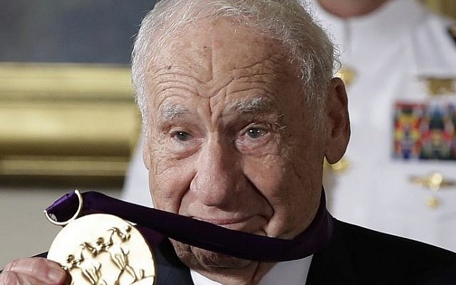 Actor, comedian and writer Mel Brooks holds up his 2015 National Medal of Arts awarded to him by President Barack Obama during a ceremony in the East Room of the White House, Thursday, Sept. 22, 2016, in Washington. (AP Photo/Carolyn Kaster) Actor, comedian and writer Mel Brooks holds up his 2015 National Medal of Arts awarded to him by President Barack Obama during a ceremony in the East Room of the White House, Thursday, Sept. 22, 2016, in Washington. (AP Photo/Carolyn Kaster)