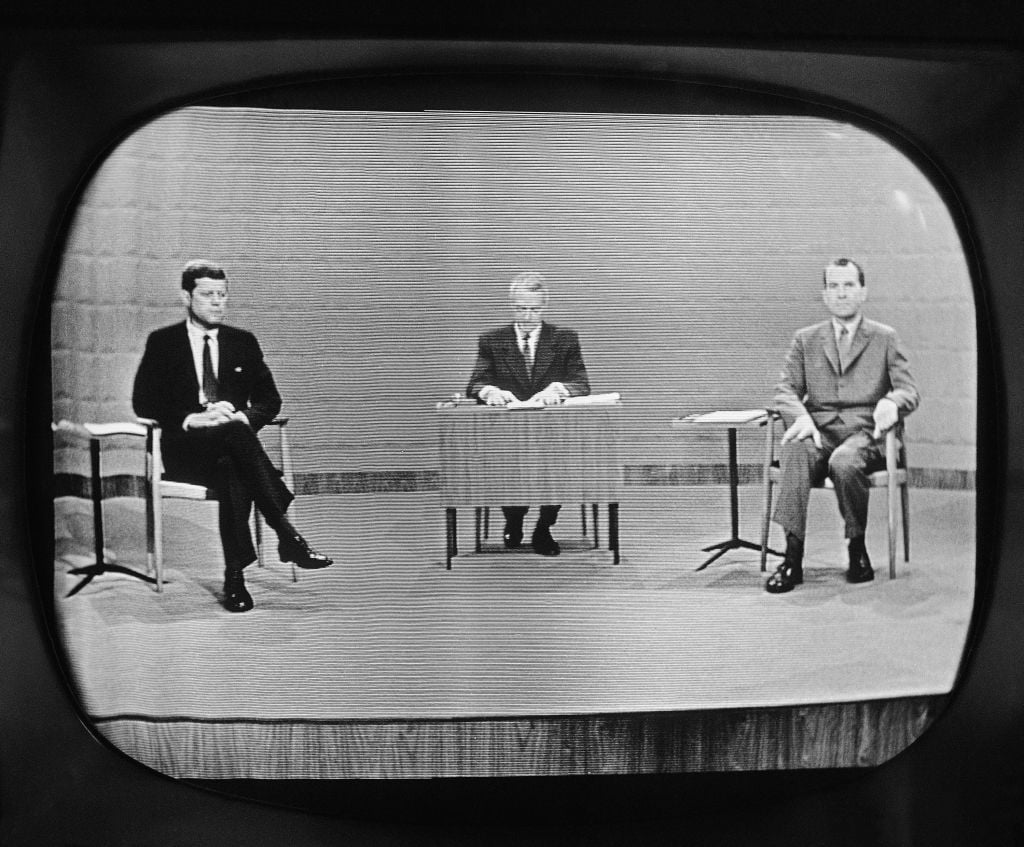 With moderator Howard K. Smith sitting between, Sen. John Kennedy, left, and Vice President Richard Nixon appear on television studio monitor set as their debate got under way, Sept. 26, 1960 in Chicago. (AP Photo) With moderator Howard K. Smith sitting between, Sen. John Kennedy, left, and Vice President Richard Nixon appear on television studio monitor set as their debate got under way, Sept. 26, 1960 in Chicago. (AP Photo)