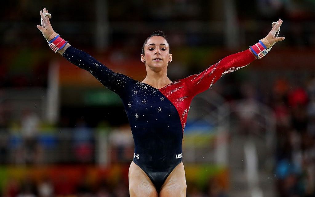 Aly Raisman competing on the uneven bars at the Rio Olympic Games, August 7, 2016. (Tom Pennington/Getty Images/JTA) Aly Raisman competing on the uneven bars at the Rio Olympic Games, August 7, 2016. (Tom Pennington/Getty Images/JTA)